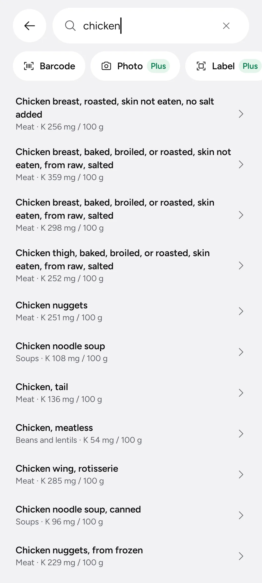 Food search results for chicken, each row carrying its own verdict colour.